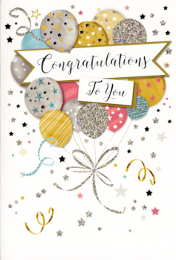 In this image, a tall, elegant congratulations card stands upright, its artwork capturing the lighthearted spirit of a celebration in Stevenage, perhaps after hearing good news at an office near Gunnels Wood Road or in a cosy home close to Fairlands Valley Park. The card's background is a gentle off-white, allowing the central illustration-a generous bouquet of balloons-to truly shine. These balloons rise from the lower half in a layered cluster, their shapes overlapping to create a sense of fullness and gentle upward motion. The colour palette is tasteful and festive: brushed metallic gold, soft silver, rich champagne, airy sky blue, tender blush pink, and a refined dove grey. Several balloons are adorned with scattered stars that glitter as if dusted with fine shimmer; others display neat stripes or delicate dot patterns, giving the impression of a carefully curated assortment chosen for an important celebration. From the balloons' bases, slender ribbons fall in sinuous, curling lines of gold and silver, looping and spiralling downwards in a way reminiscent of the curling ribbons used to finish off flower arrangements for big occasions. Around the balloons, the background is sprinkled with small stars and swirling flourishes, arranged so they look like pieces of confetti caught mid-air, adding life and movement to the scene. Crossing the centre of the card is a stylised banner, slightly bowed at the middle, as if gently lifted by the surrounding balloons. On this banner, the words Congratulations To You are written in elegant calligraphy, the lettering slightly bold and likely raised to the touch, lending the design an extra sense of quality. Overall, the card gives off a feeling of polished celebration and heartfelt pride, ideal to accompany a bouquet marking milestones from exam success to promotions across Stevenage.